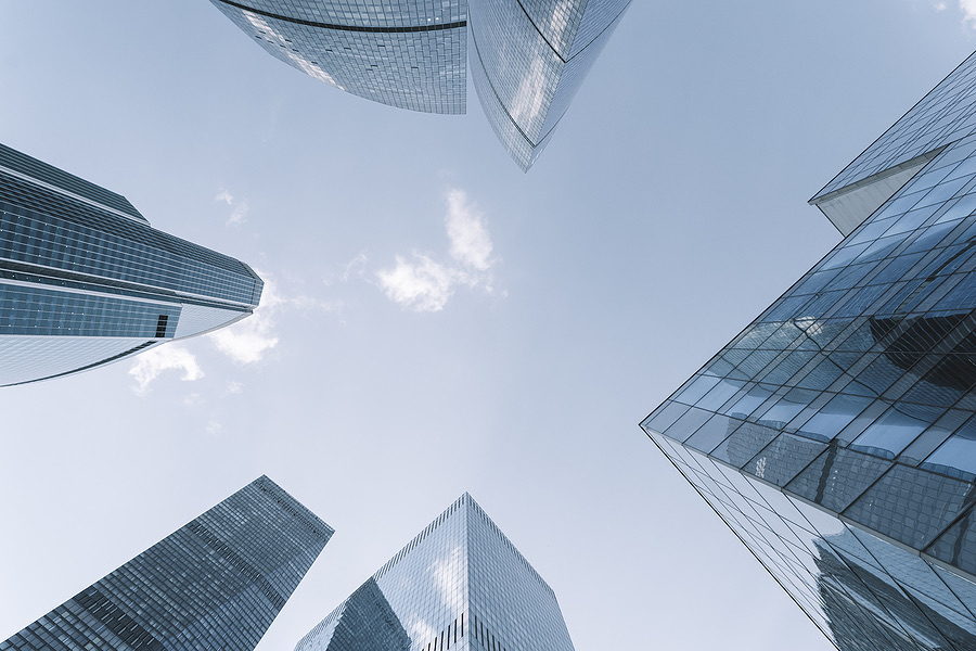 Low angle view of downtown office skyscrapers against the sky