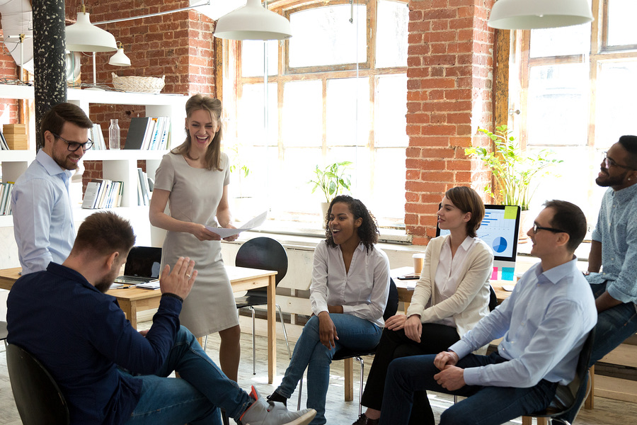 Team gathered for a discussion in an open office